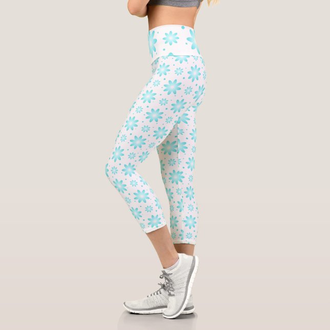 White and turquoise delicate daisy, dots pattern  capri leggings (Left)