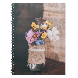 WHITE AND YELLOW PETALED FLOWERS IN GLASS VASE NOTEBOOK