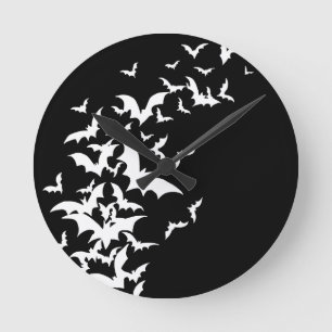 White Bats on Black Round Clock