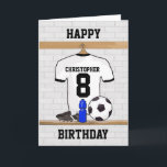 White Black Football Soccer Jersey Happy Birthday Card<br><div class="desc">A customisable sports themed Happy Birthday card with a white and black football soccer shirt, hanging in the locker room. Just add your the name and number (or age) of the Birthday boy or girl for a unique and personalised soccer Birthday card. Other soccer team colours available in our store...</div>