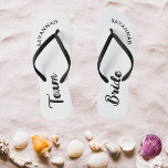 White Black Name Bride Bridal Party Bachelorette Jandals<br><div class="desc">A simple black and white minimalist typography design for a bridal shower, bachelorette party or beach wedding. The text is customisable and can be personalised with your own name and bride slogan. For example, Bride Squad instead of Team Bride, Bride repeated on the left and right foot, or something else....</div>