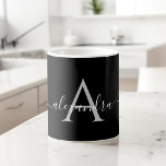 White Black Name Initial Monogram Elegant Script Coffee Mug<br><div class="desc">Black and White Elegant Monogram Hand Lettered Script Name and Initial Coffee Mug. The mug makes the perfect gift for someone who loves modern and stylish chic colours for a birthday,  wedding,  Christmas Holiday,  bridal shower or special occasion gift. Please contact the designer for matching items.</div>