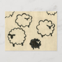 White & Black Sheep on Cream Background