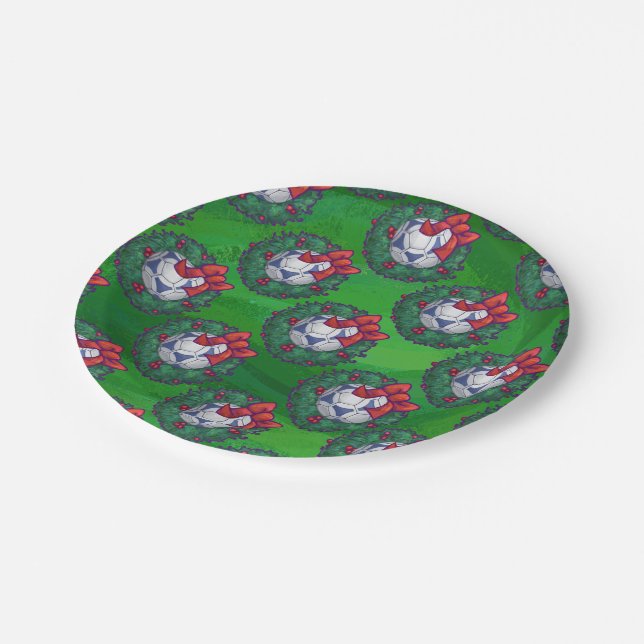 White, Blue Festive Soccer Ball on Green Paper Plate (Angled)