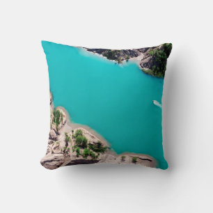 WHITE BOAT ON BLUE SEA WATER DURING DAYTIME CUSHION