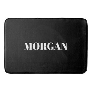 White Bold Name on Black Bath Mat