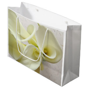 White calla lilies from above large gift bag