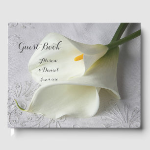 White calla lilies on linen guest book