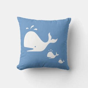 white CARTOON whale  on  blue pillow