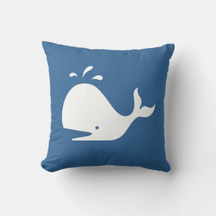 white CARTOON whale  on medium blue pillow