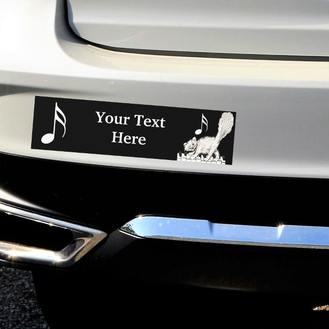 White Cat on Piano Keys Bumper Sticker (White winking cat on piano keys with white music notes on black bumper sticker for your car.)