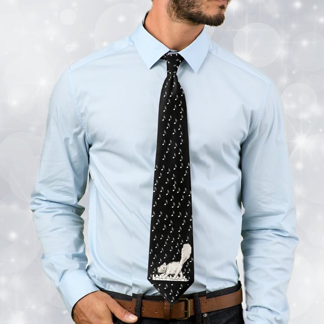 White Cat on Piano Keys Tie (Winking white cat walking on piano keys music notes on black and white neck tie.)