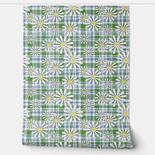 White chamomile flowers on a green blue chequered wallpaper