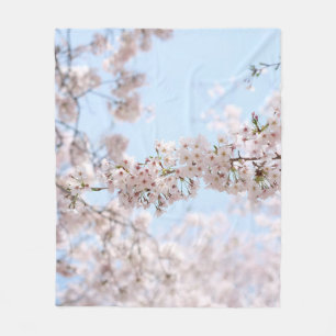 White cherry blossom under clear blue sky in the m fleece blanket