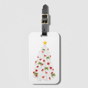 White Christmas Tree decorated with Red and Green Luggage Tag