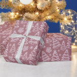 White Christmas Trees and Snowflakes Christmas Wrapping Paper<br><div class="desc">Introducing our Modern Mauve Christmas Wrapping Paper, a delightful choice to add a touch of elegance and whimsy to your holiday gifts! The soft mauve background provides a subtle and sophisticated backdrop for a charming winter scene. Adorned with super cute white Christmas trees and delicate snowflakes, this wrapping paper captures...</div>
