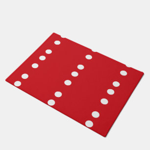 White circles on red doormat