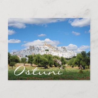 White city Ostuni and olive trees text postcard