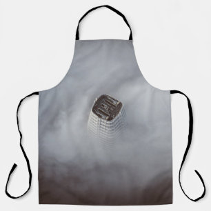 WHITE CONCRETE BUILDING SURROUNDED BY CLOUDS APRON