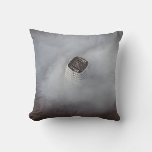 WHITE CONCRETE BUILDING SURROUNDED BY CLOUDS CUSHION