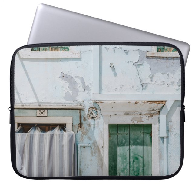 WHITE CONCRETE BUILDING WITH THREE GREEN WINDOWS A LAPTOP SLEEVE (Front)