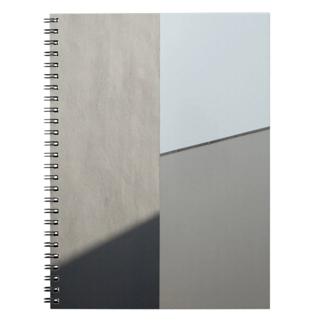 White concrete wall in the morning notebook (Front)