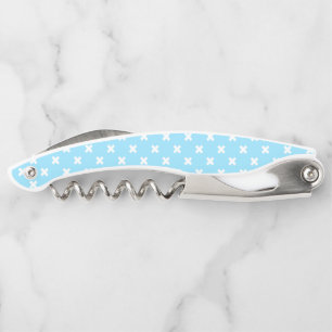 White cross stitches on baby blue corkscrew