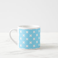 White cross stitches on baby blue