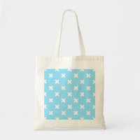 White cross stitches on baby blue