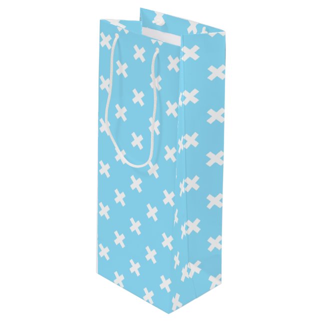 White cross stitches on baby blue wine gift bag (Front Angled)