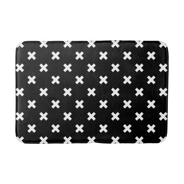 White cross stitches on black bath mat (Front)
