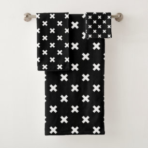 White cross stitches on black bath towel set