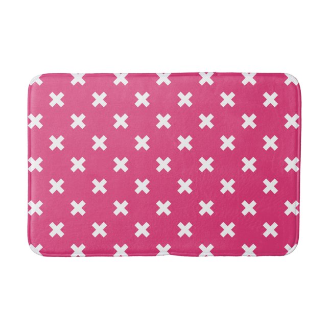 White cross stitches on fuchsia bath mat (Front)