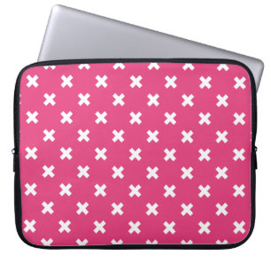 White cross stitches on fuchsia laptop sleeve