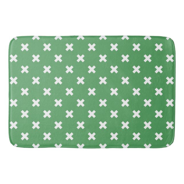 White cross stitches on green bath mat (Front)