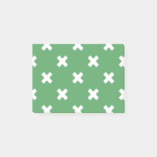White cross stitches on green post-it notes (Front)