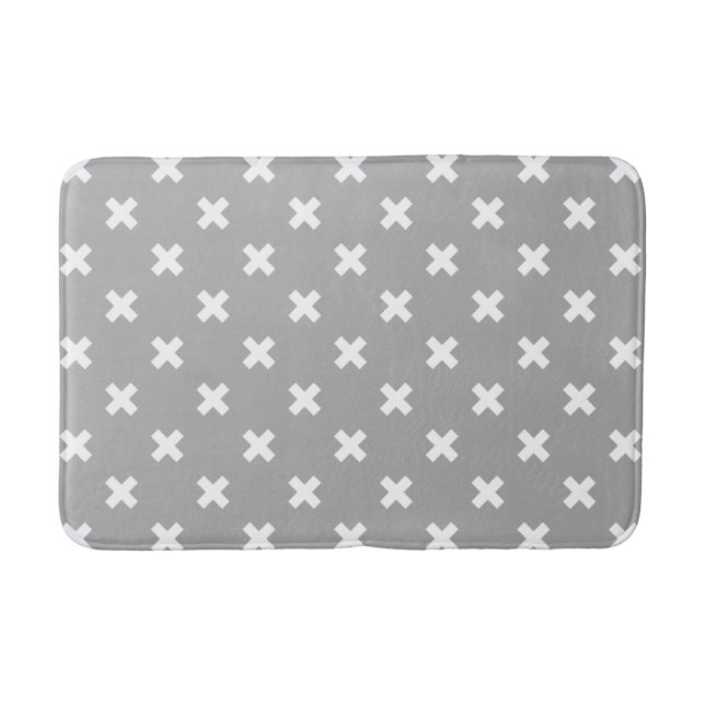 White cross stitches on grey bath mat (Front)