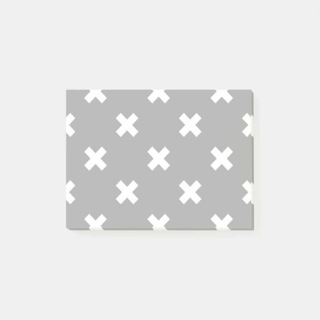 White cross stitches on grey post-it notes (Front)