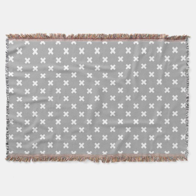White cross stitches on grey throw blanket (Front)