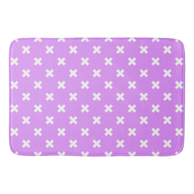 White cross stitches on lilac bath mat (Front)