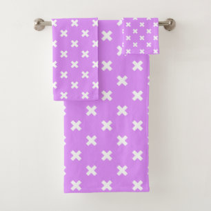 White cross stitches on lilac bath towel set