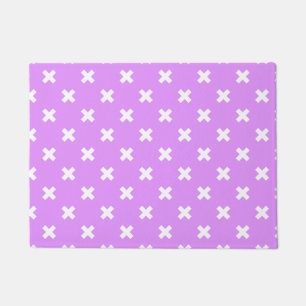 White cross stitches on lilac doormat
