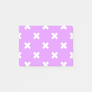 White cross stitches on lilac post-it notes