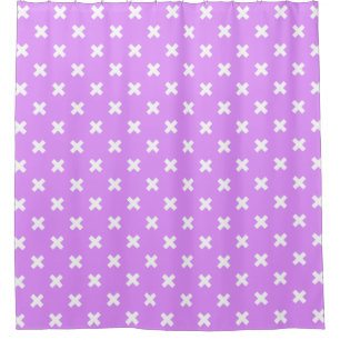White cross stitches on lilac shower curtain
