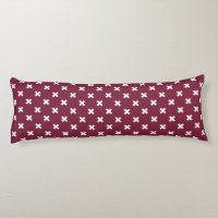 White cross stitches on mulberry
