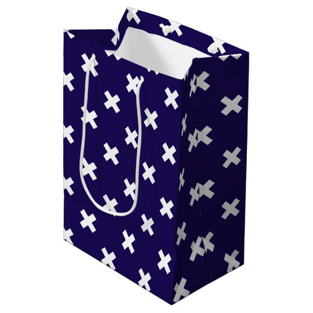 White cross stitches on navy blue medium gift bag (Front Angled)