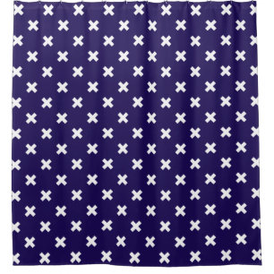 White cross stitches on navy blue shower curtain