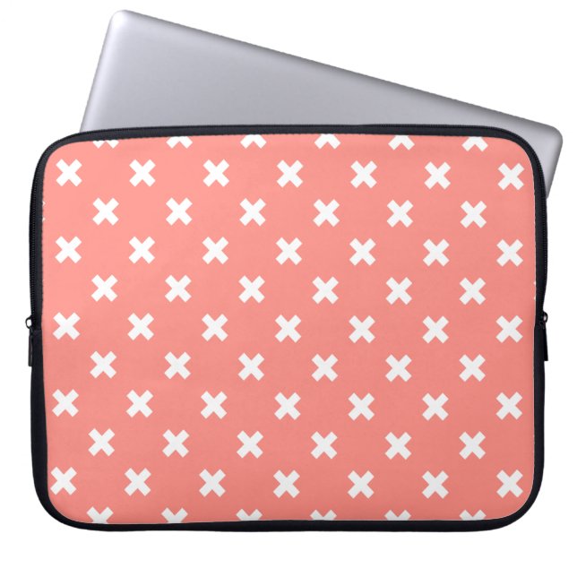 White cross stitches on peach laptop sleeve (Front)