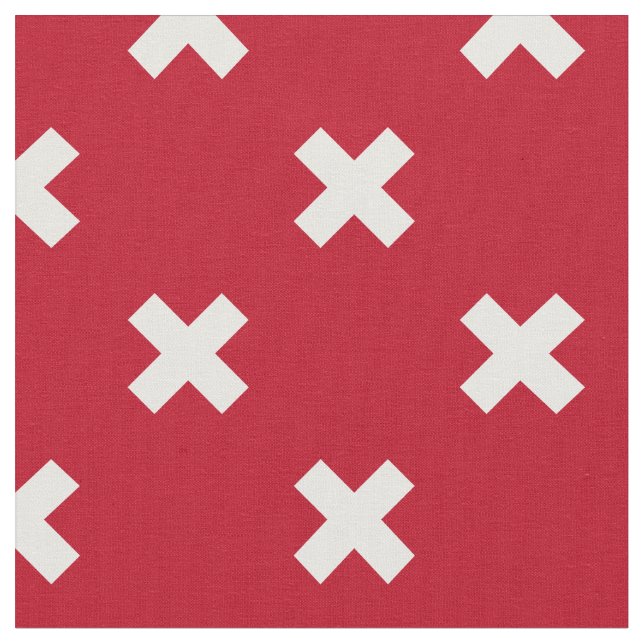 White cross stitches on red fabric (Close Up)