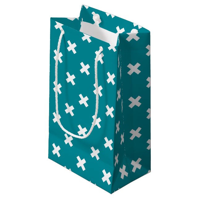 White cross stitches on teal small gift bag (Front Angled)